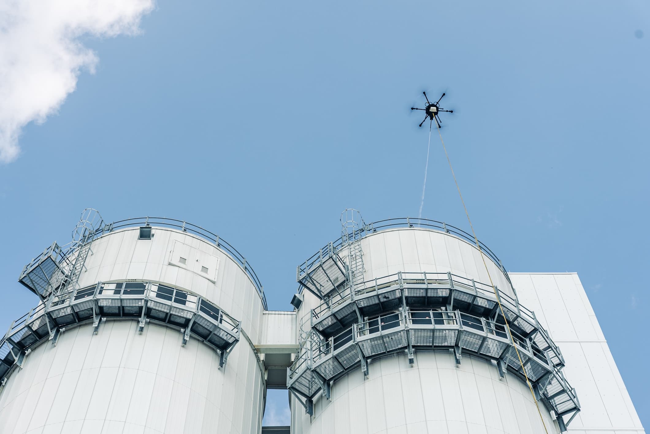 Sherpa Drone cleaning the exterior of a commercial building